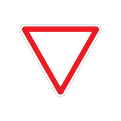 A triangular yield sign with a red border is displayed prominently near a suburban intersection, guiding approaching drivers to slow down and yield to oncoming traffic