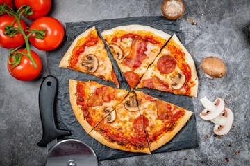Authentic Canadian Style Pizza with Bacon, Pepperoni, and Mushrooms – Overhead Shot