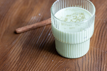 close-up smoothie matcha in glass crystal glass