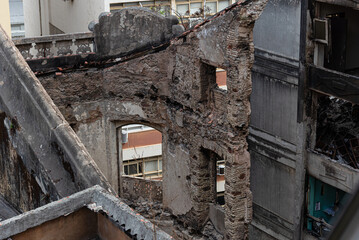 Fototapeta premium View from above of a ruined building ready for demolition after a fire. Salvador, Brazil.