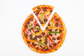 Sliced Meatball and Vegetable Pizza Menu Item on white background, top down view