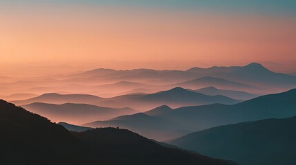 Serene mountain range layers bathed in warm golden hour light, creating a tranquil and breathtaking natural vista