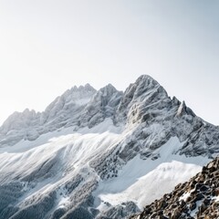 Majestic Snow-Capped Mountain Peak with Lush Valley Below
