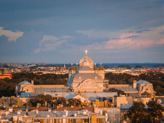 Riga, Latvia, at sunset featuring a The Nativity of Christ Cathedral in Riga, Latvia as well as National art museum.