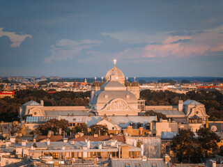 Fototapeta premium Riga, Latvia, at sunset featuring a The Nativity of Christ Cathedral in Riga, Latvia as well as National art museum.