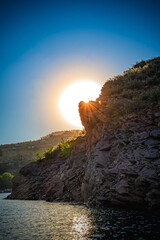Rocks and lake at Horsetooth Reservoir at sunset