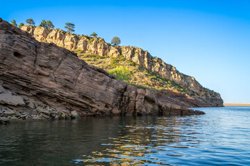Rocks and lake at Horsetooth Reservoir at sunset