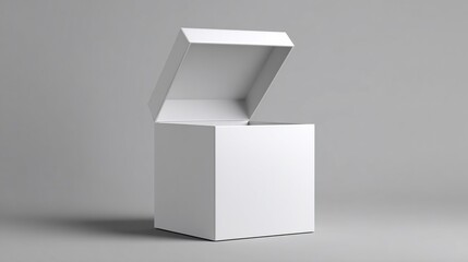 White cube-shaped box with open lid, casting shadow on gray background