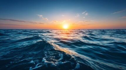 Obraz premium Wide ocean waves at sunrise.