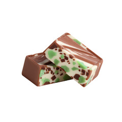 Two pieces of layered mint chocolate fudge with green swirls and chocolate chips