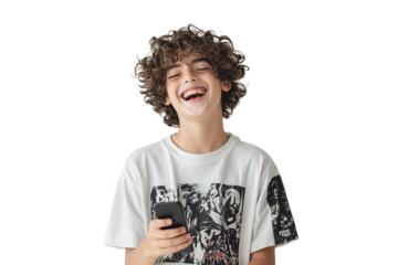 Happy curly-haired boy laughs and uses phone with PNG transparent background for product staging or social media design.