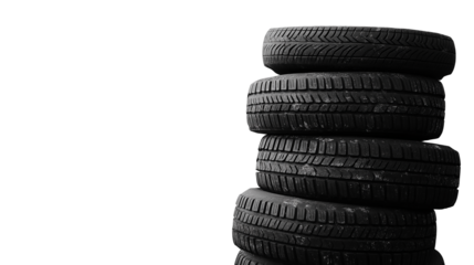 Four black rubber car tires stacked neatly on top of each other  isolated on white background or transparent png 
