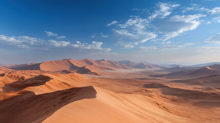 Naklejka premium experience breathtaking beauty of namib desert sand dunes in namibia where golden hues contrast against deep blue