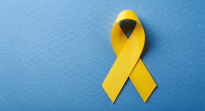National Suicide Prevention Month - Awareness yellow ribbon supporting hope and solidarity for various important causes and medical conditions