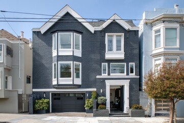 Obraz premium Luxurious modern home with elegant architecture in a tranquil neighborhood, featuring large windows and inviting entrance, perfect for families seeking comfort and style