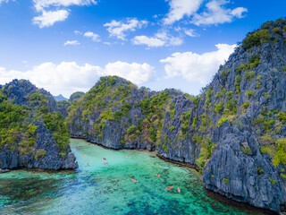 Big Lagoon and Small Lagoon at Miniloc Island near El Nido, Palawan, Philippines. Aerial 4K drone video footage of crystal clear lagoon