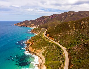 Coastal highway winding through hills