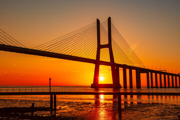 Vasco da Gamma road bridge in Portuguese capital Lisbon at sunrise.