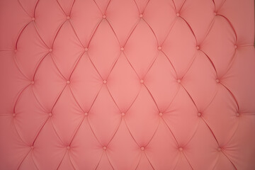 Naklejka premium Soft pink quilted leather texture with diamond pattern and button tufting, elegant luxury upholstery background for furniture design, home interior decor, fashion accessories and textile