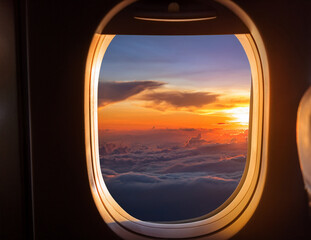 Sunset View from Airplane Window with Golden Sky