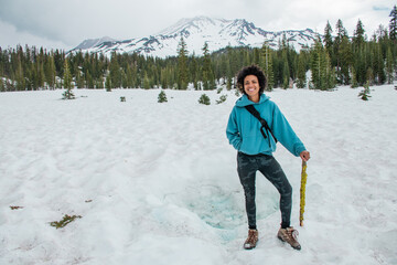 young woman in winter forest