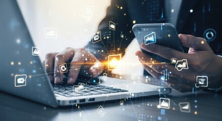 Close up of hands using laptop and smartphone with glowing digital network connections and icons overlay