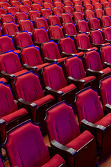 Obraz premium Empty theater red seats - stock photo
