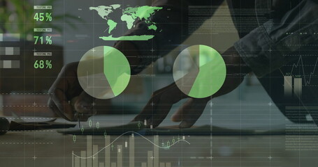Analyzing data, African American man tapping tablet with stylus in office, with green data overlays