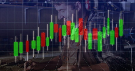 Sketching craftsman in leather apron at workshop bench, with pencil and candlestick chart overlay