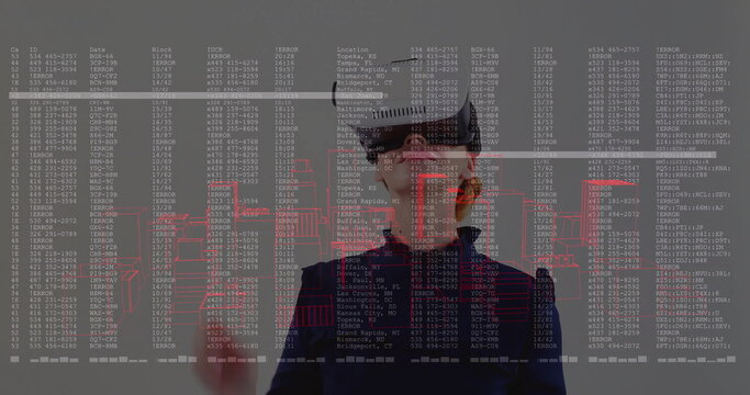 Touching display woman in business top wearing AR visor analyzing data in tech lab with schematics