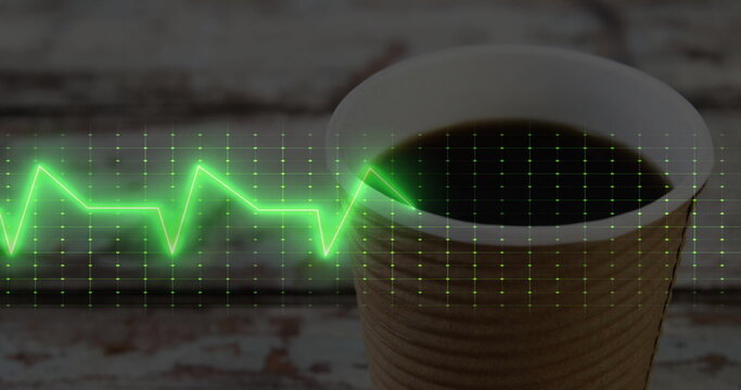 Fototapeta Corrugated coffee cup sitting on distressed wood tabletop, with neon green ECG grid, copy space