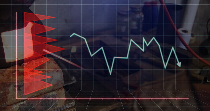 Metal bench vise clamping wooden workbench in workshop, red bar chart, green line graph, copy space