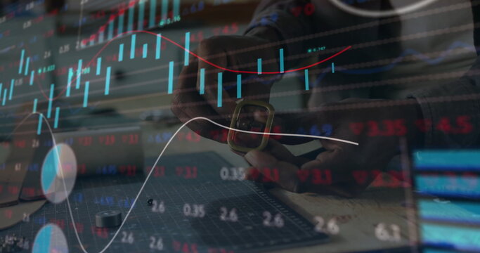 Technician hands adjusting smartwatch strap in workshop, with cutting mat and stock market overlays - Powered by Adobe