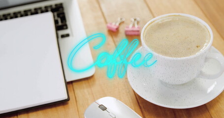 Featuring coffee cup and saucer resting on desk with laptop, turquoise Coffee overlay, copy space © vectorfusionart