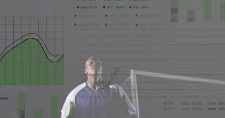 Analyzing athlete wearing soccer jersey gazing upward on field by goal, with projected data visuals