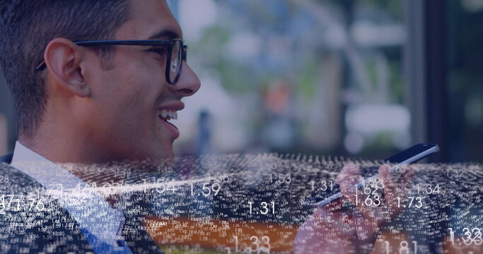 Smiling businessman wearing glasses and tie using smartphone amid data overlay in lobby, copy space - Powered by Adobe