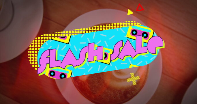 Displaying FLASH SALE banner across wooden table, with coffee cups, latte art, cassette tape icons
