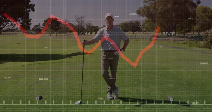 Standing golfer gripping driver club and analyzing digital graph over ball on golf teeing ground