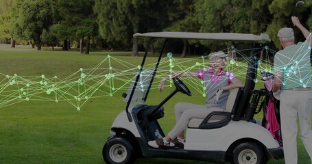 Waiting mature couple riding white golf cart with golf bag on fairway, man holding golf club