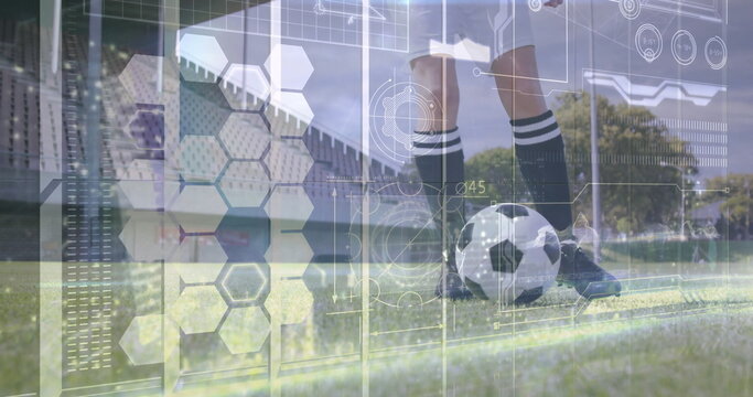 Balancing female soccer player wearing kit, foot on soccer ball at sideline, hex overlay