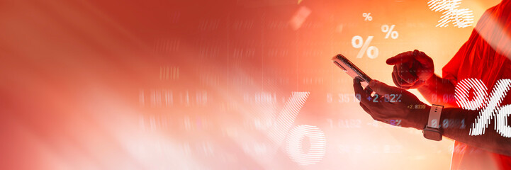 Creative person holding smartphone with floating percentage symbols and statistical data on vibrant...