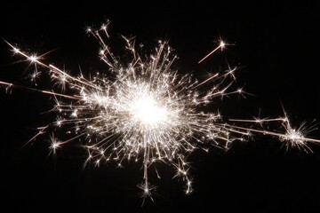 Naklejka premium Sparkling firework burst against black background