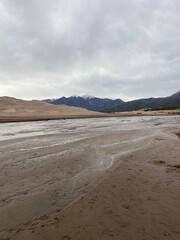 sand dunes and clouds
