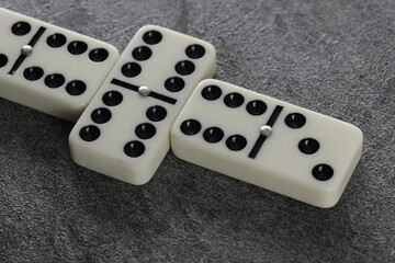 white domino blocks on black background