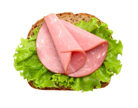 A simple openfaced sandwich with folded pink ham and fresh lettuce on dark rye bread.