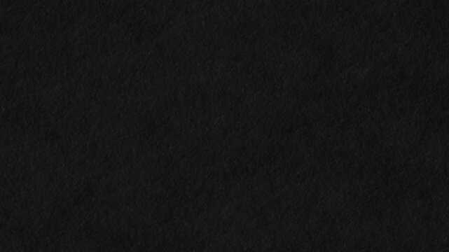 Paper background texture.Seamless looping black crumpled paper
