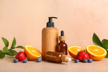 Natural cosmetic products with fruits on beige background