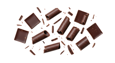 Dark chocolate pieces and shavings isolated on transparent background
