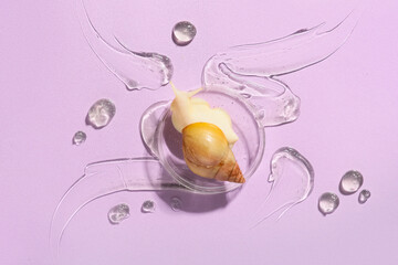 Petri dish, Giant Achatina snail and samples of cosmetic gel on pink background, closeup