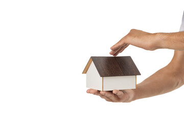 Hands showcase a house model for real estate, isolated on white, PNG
